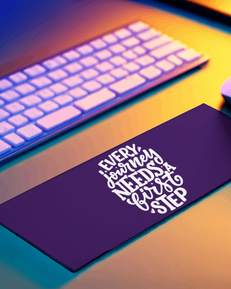 Thin Gaming Pad Beside White Keyboard Having Golden Color In Background