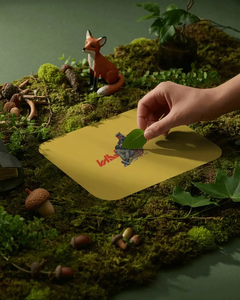 Enchanted Forest Gaming Pad Mockup With Moss Leaves And Miniature Fox Figure