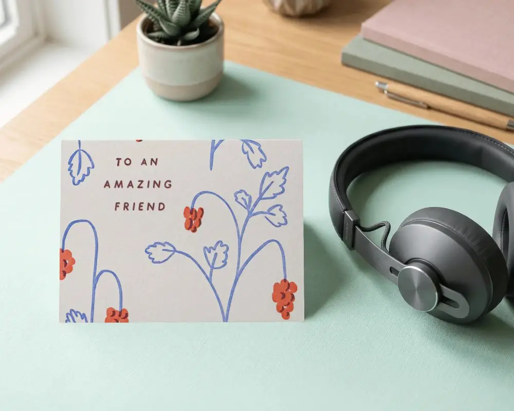Blank Horizontal Greeting Card Mockup On Modern Desk With Headphones And Stationery