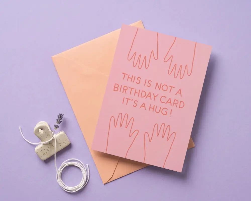Minimalistic Greeting Card Mockup With Envelope And Accessories On Solid Color Surface