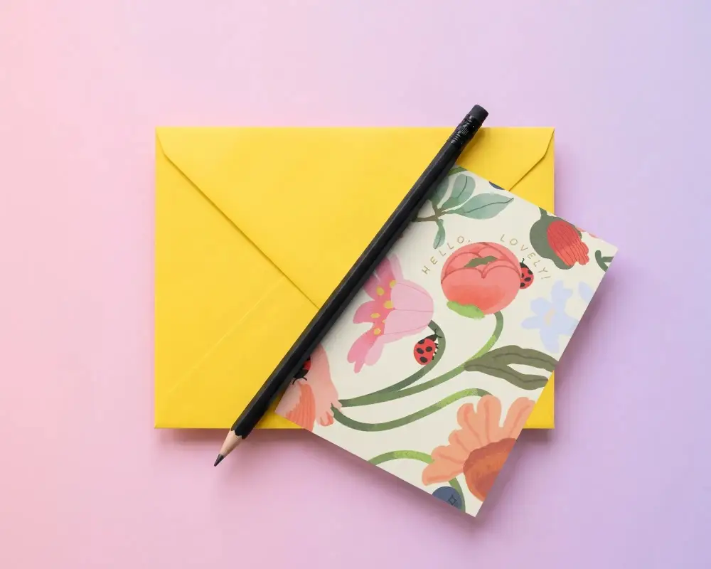 Realistic Greeting Card Mockup With Pencil On Top Of Envelope Simple Background Layout