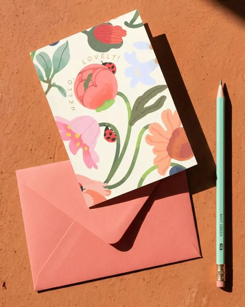 Elegant Greeting Card Mockup With Envelope And Pencil On Rough Surface Background
