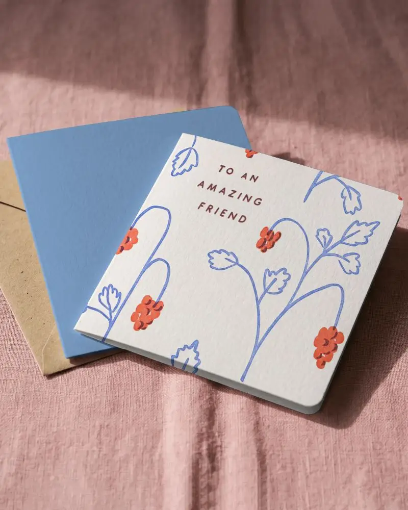 Square Folded Greeting Card Mockup With Rounded Corners On Textured Fabric Background