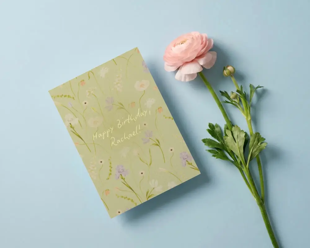 Minimalistic Greeting Card Mockup With Natural Flower Decor On Clean Solid Background