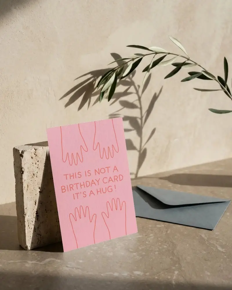 Textured Paper Greeting Card Mockup With Envelope On Stone Surface In Sunny Light
