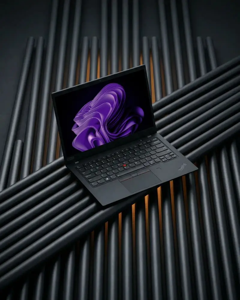 Sleek Modern Laptop Mockup On Textured Tube Background With Open Screen For Presentations