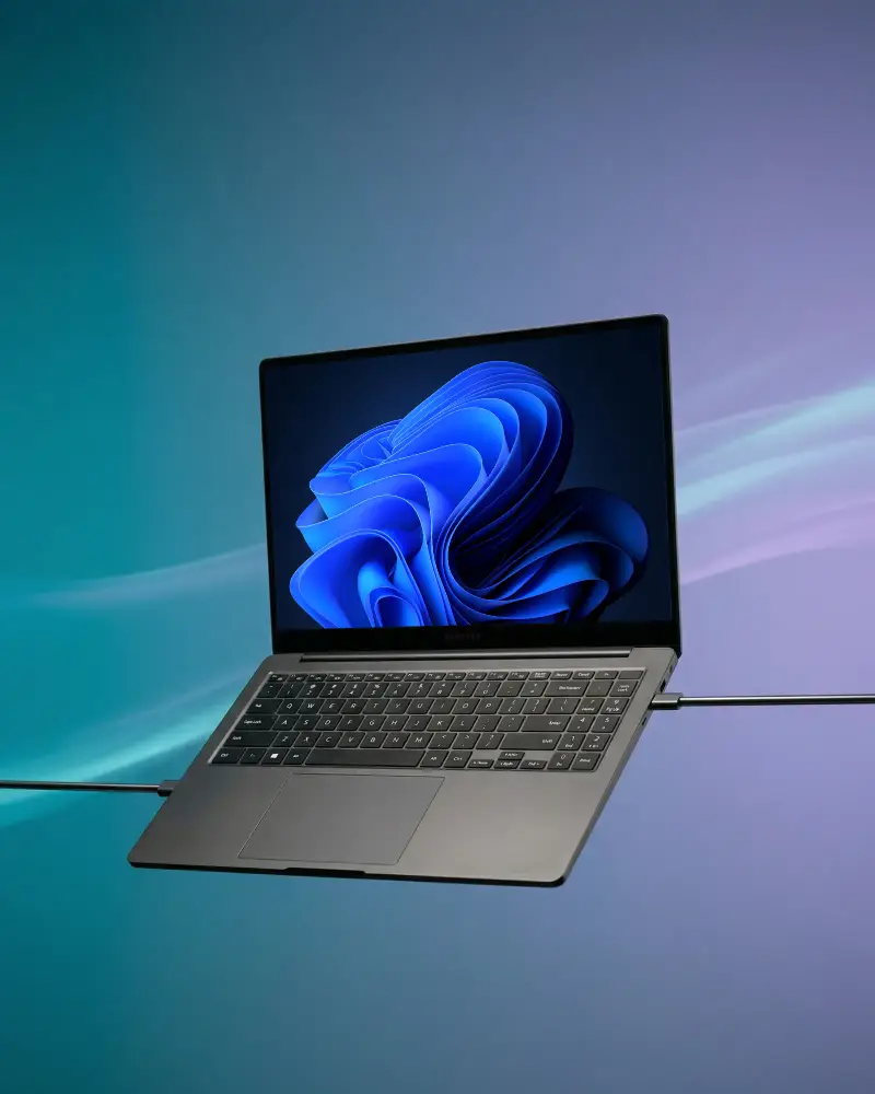 Sleek Microsoft Laptop Mockup Floating With Multiport Connection Cable For Digital Showcase