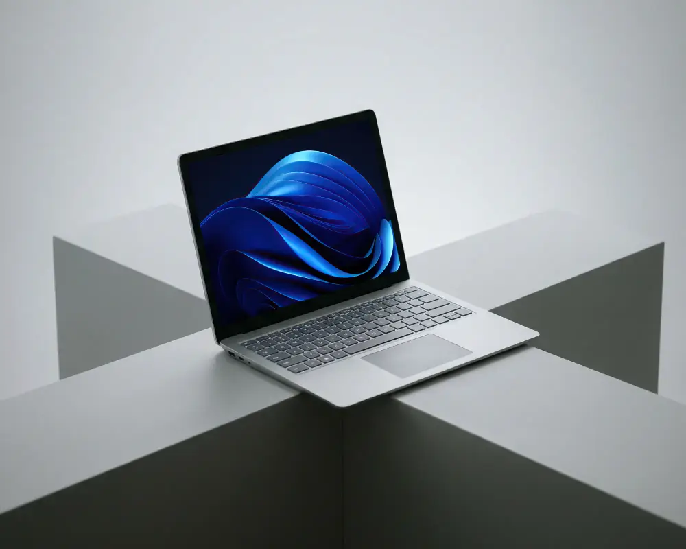 Sleek Microsoft Laptop Mockup On Intersecting Rectangular Surfaces For Tech Presentation