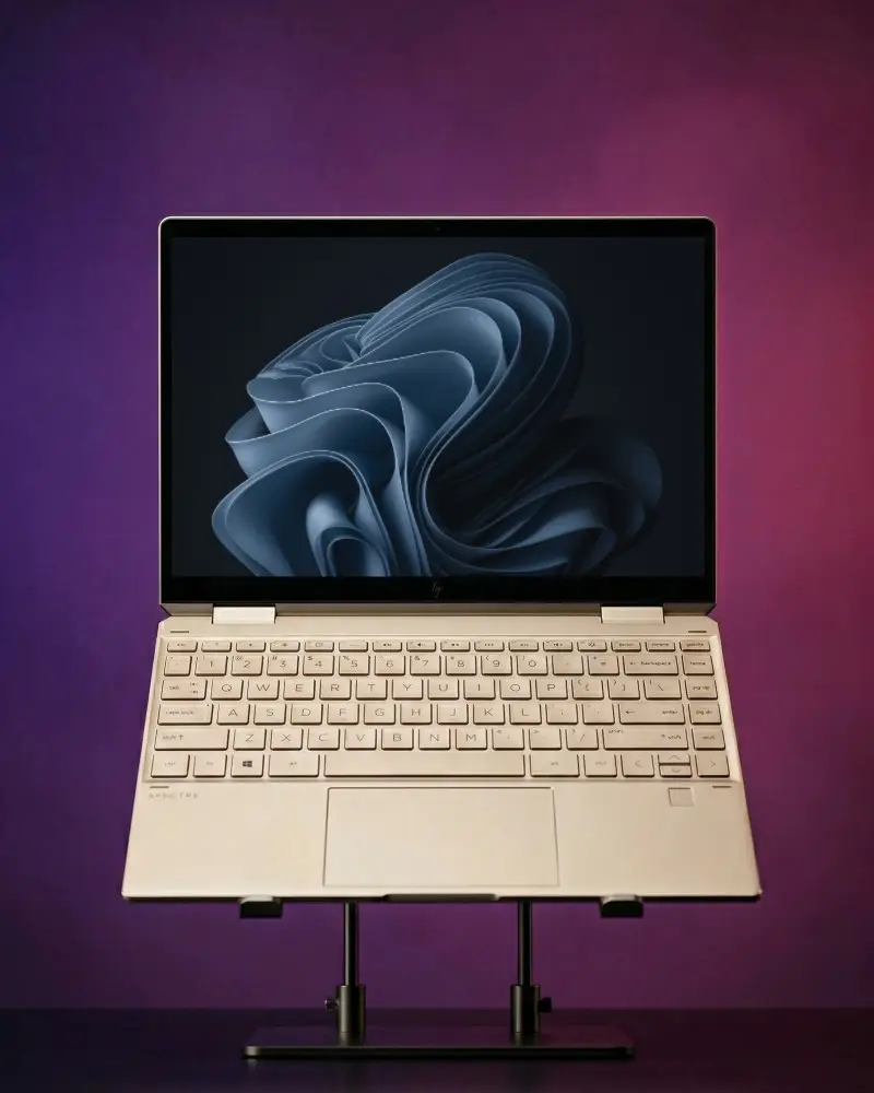 Portable Hp Laptop Mockup With Keyboard And Screen Display On Adjustable Stand For Presentation