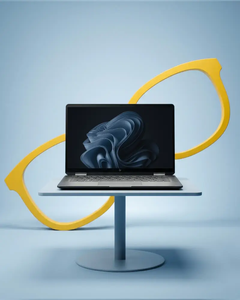Sleek Hp Laptop Mockup On Round Table With Minimalistic Oversized Glasses Frame Backdrop Design