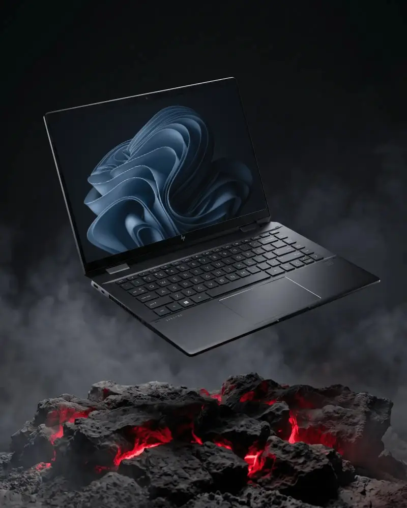 Modern Sleek Hp Laptop Floating Above Glowing Hot Coals Digital Tech Innovation Concept