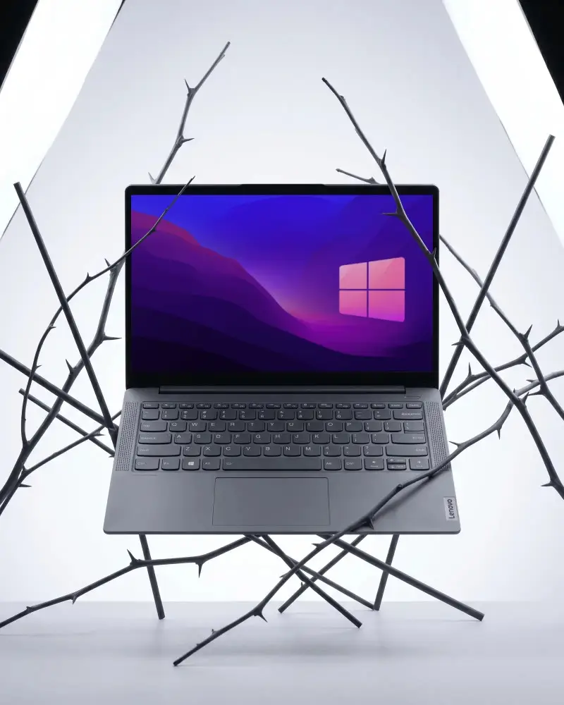 Sleek Modern Lenovo Laptop Mockup Floating Among Minimalistic Thorny Branches Studio Lighting