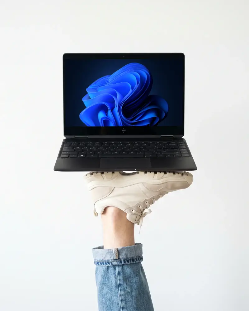 Modern Hp Laptop Mockup With Blank Screen Floating On Shoe In Studio Environment For Design