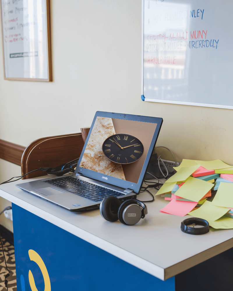 Sunlit Desk Laptop Mockup On Modern Office Table With Sticky Notes And Headphones In A Creative Workspace 029