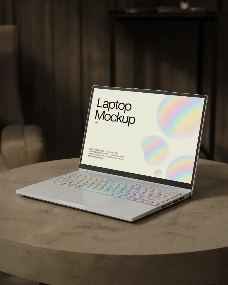 luxury-setup-laptop-mockup-rgb-keyboard-laptop-on-stylish-concrete-round-table