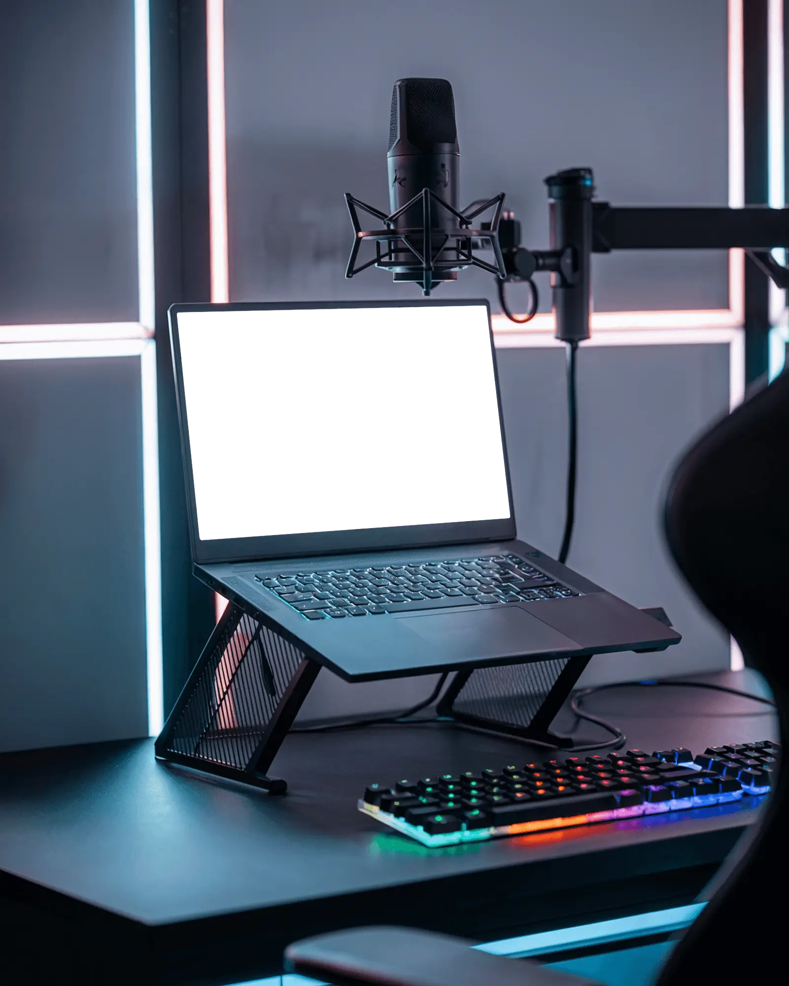 rgb-lit-streaming-setup-laptop-mockup-on-stand-with-gaming-keyboard-and-studio-microphone