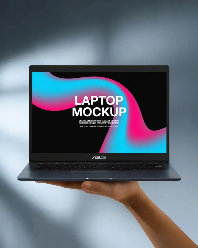 Hand Holding Asus Laptop Mockup With Blank Black Screen Against Blurred Background