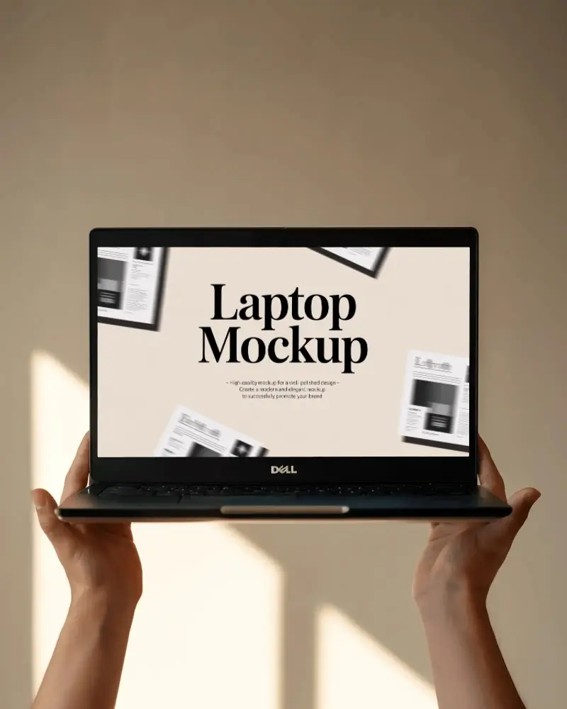dell-laptop-mockup-held-up-by-hands-in-soft-natural-light-with-minimal-wall-background