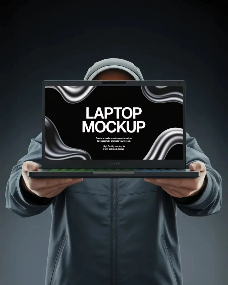 Sleek Razer Laptop Mockup Presented By Person In Hoodie With Bold Minimal Gaming Vibes