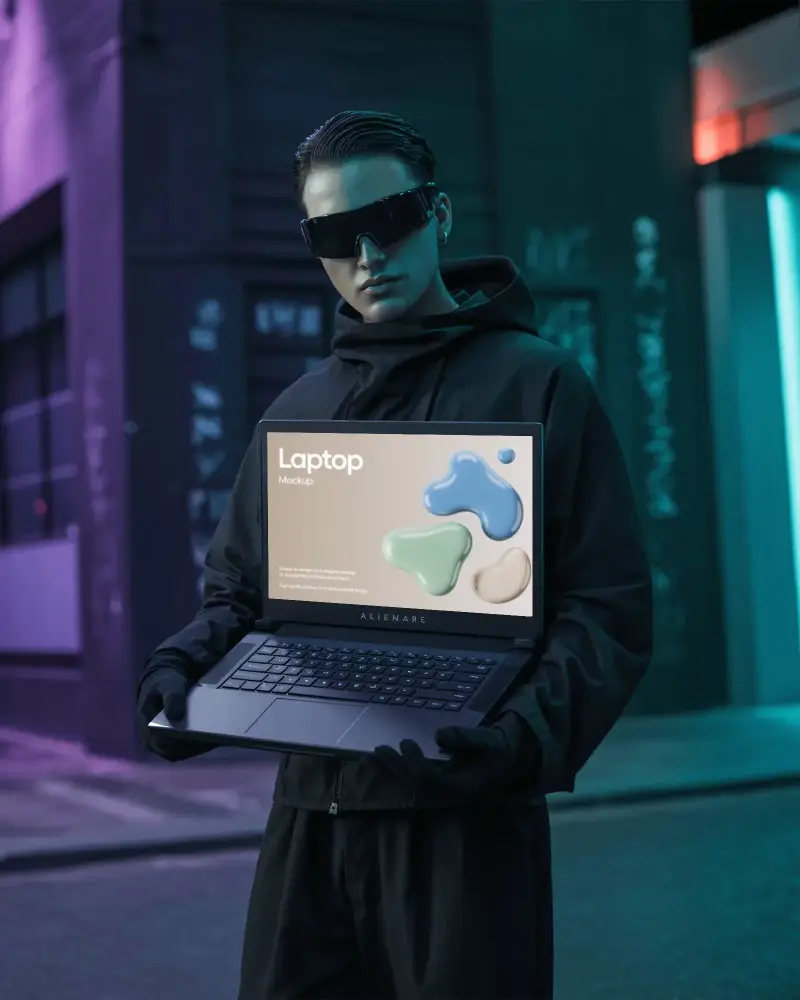 Alienware Gaming Laptop Mockup Held By Model In Cyberpunk Street With Purple And Blue Neon Light