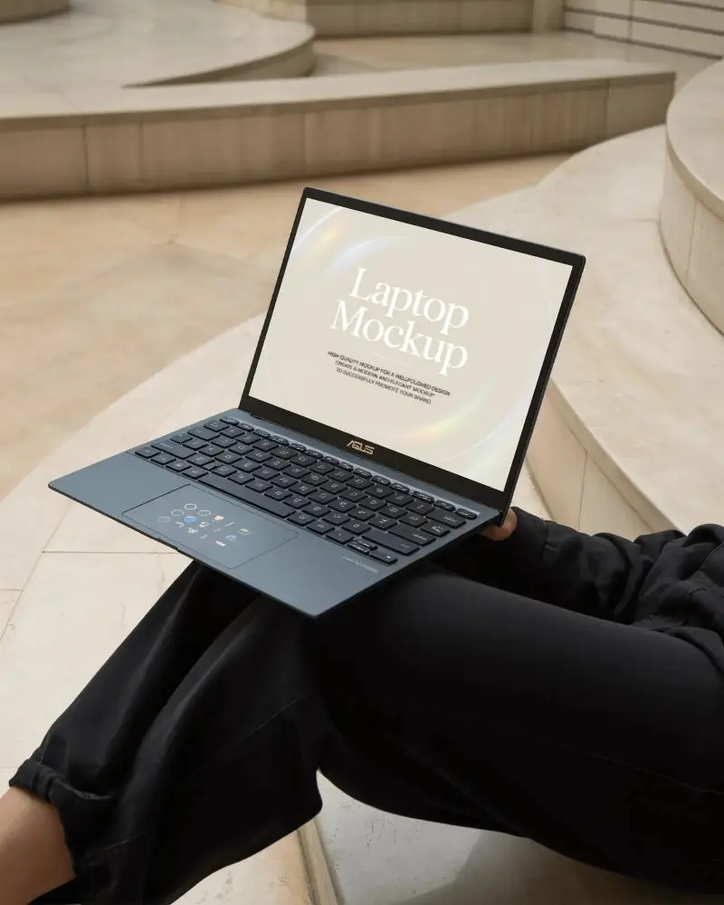 Asus Laptop Mockup On Persons Lap In Modern Architectural Space With Minimal Beige Stone Design