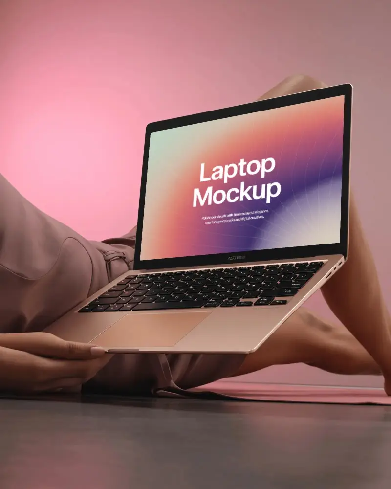 Microsoft Surface Laptop Mockup In Rose Gold Color Held By Person In Pink Outfit With Soft Lighting