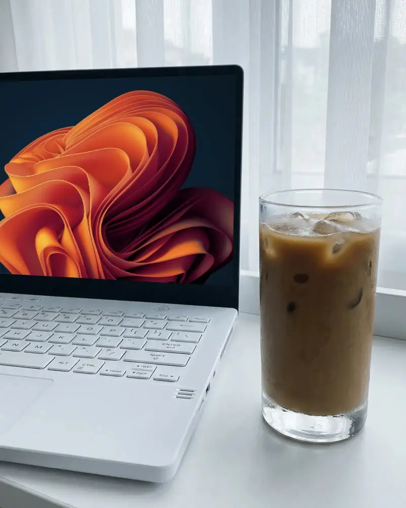 Modern Laptop Mockup With Iced Coffee On Minimalist Desk Setup For Workstation Display