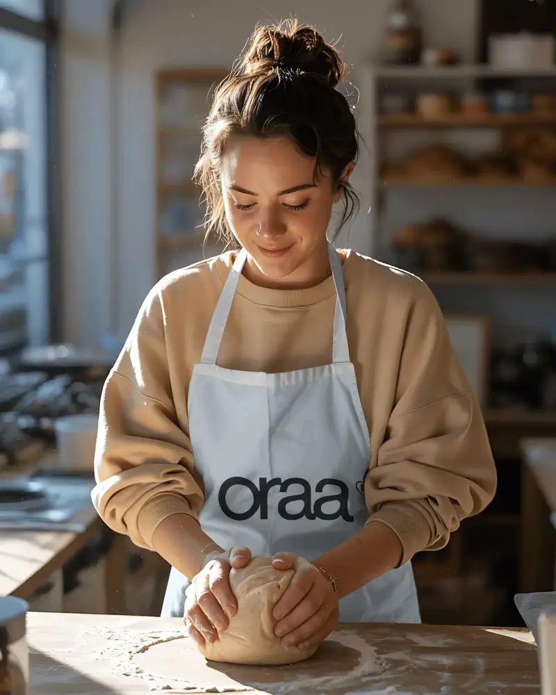 Stylish Functional Apron Logo Mockup Providing Protection While Prepping Cooking And Baking