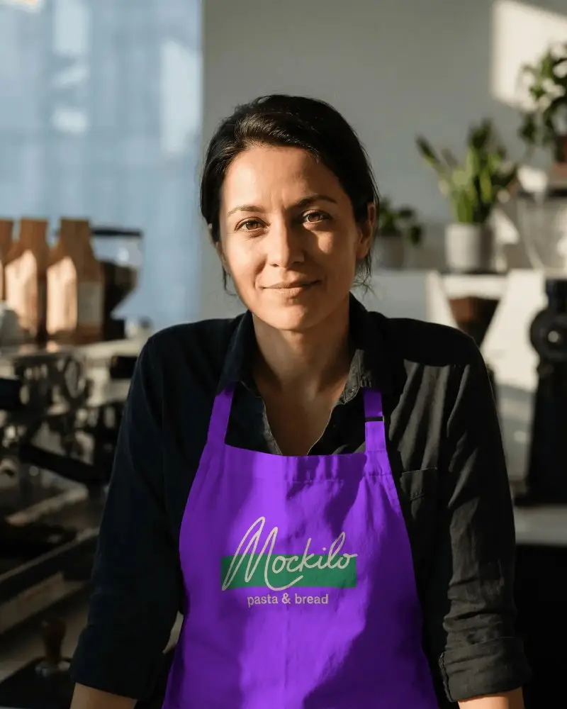 Confident Barista Preparing Coffee With Well Fitted Apron In Modern Coffee Shop