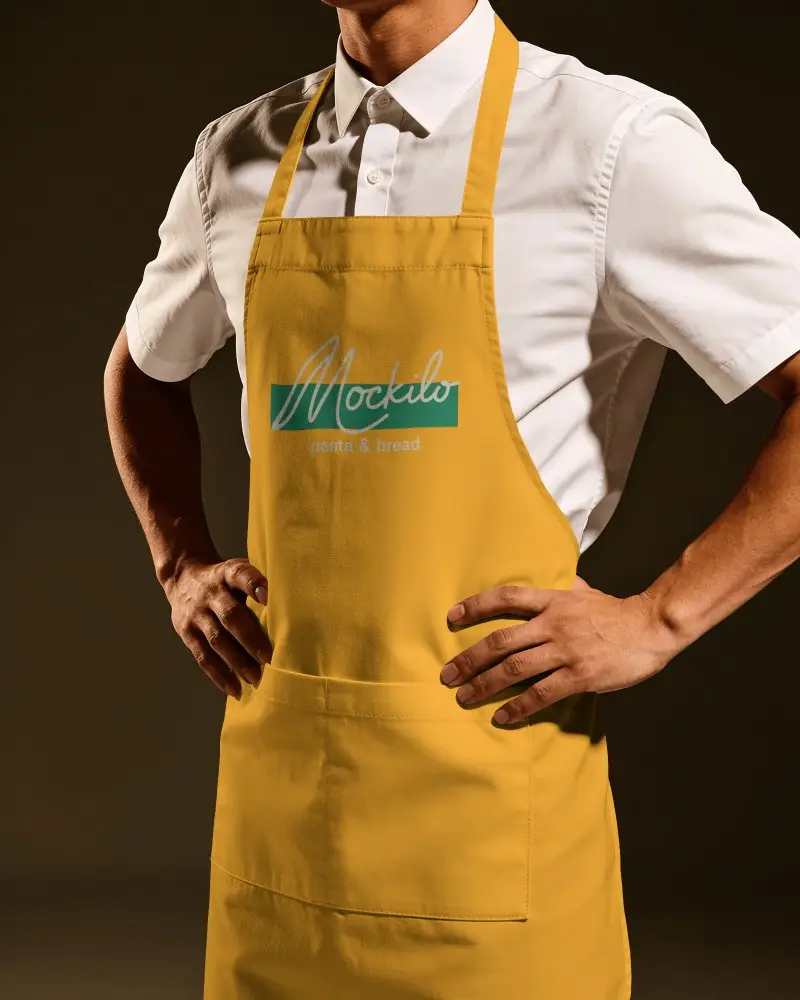 Chef Apron Mockup Male Model In White Button Shirt With Hands On Waist And Dark Studio Background