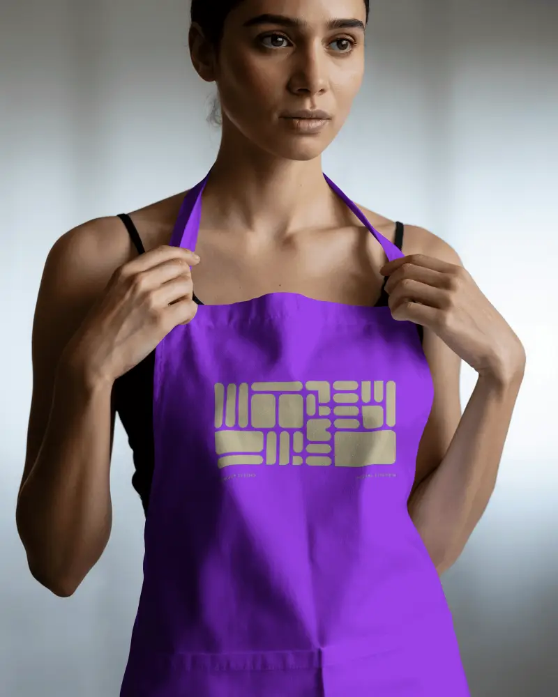 Close Up Apron Mockup With Model Adjusting Straps Studio Shot Focused On Fit And Fabric Draping