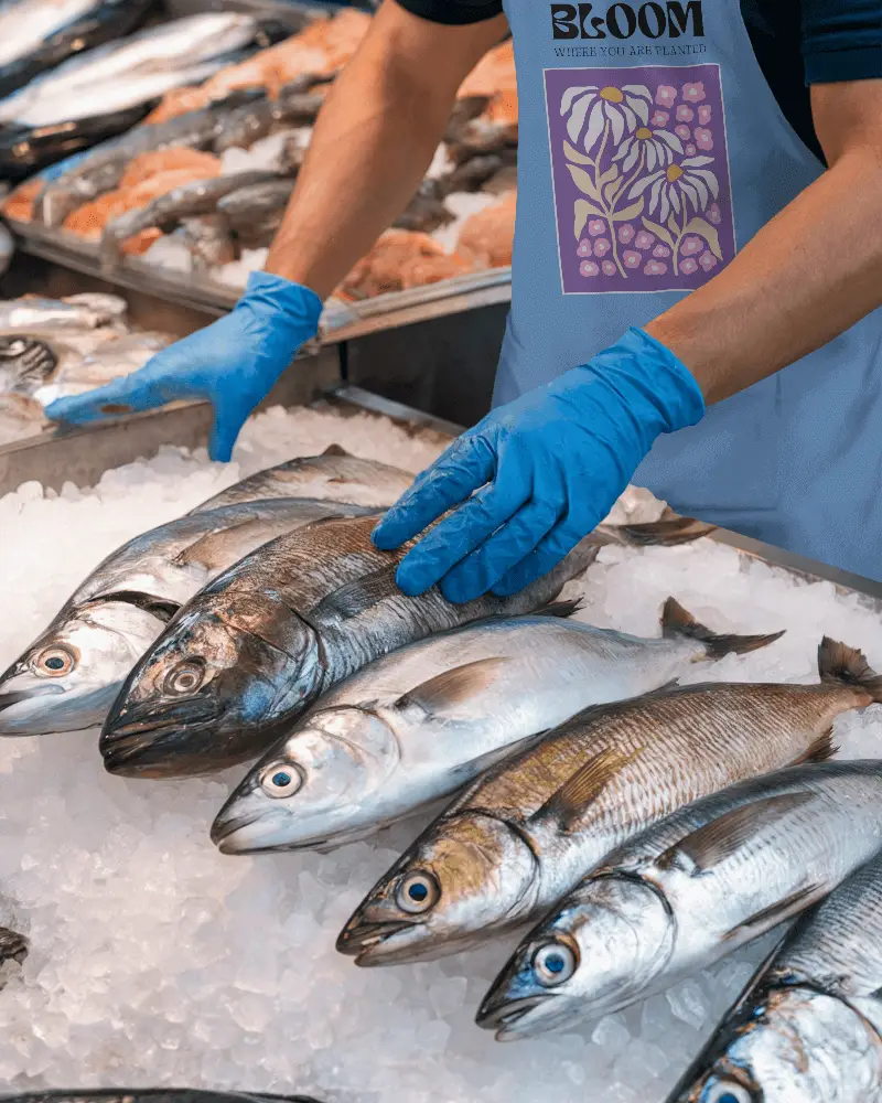 Seafood Market Apron Mockup Fishmonger With Blue Gloves And Ice Display