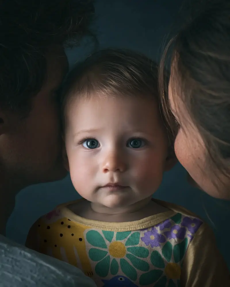Adorable Baby Tee Mockup Showcasing Cute Infant With Loving Parental Embrace
