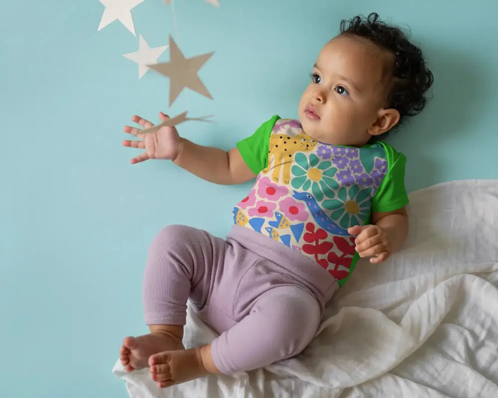 Adorable Baby Infant Tee Laying On Blanket Soft Background Star Mobile Mockup