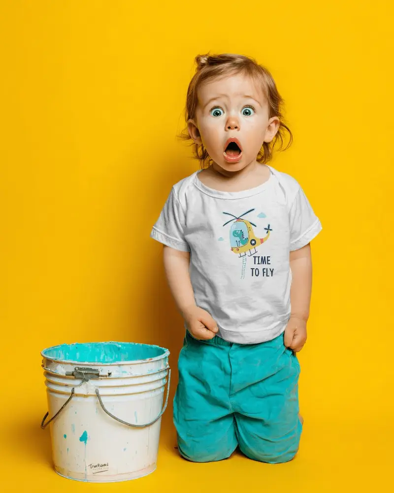 Toddler Model Wearing Basic Baby Tee Mockup With Comfortable Shorts With Paint Bucket Prop
