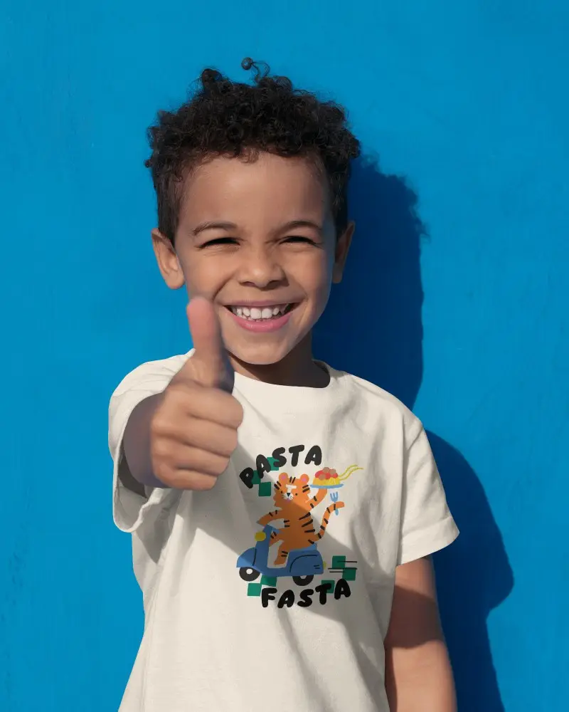 Baby Tee Mockup Happy Child Wearing Tshirt Giving Thumbs Up Against Bright Blue Wall