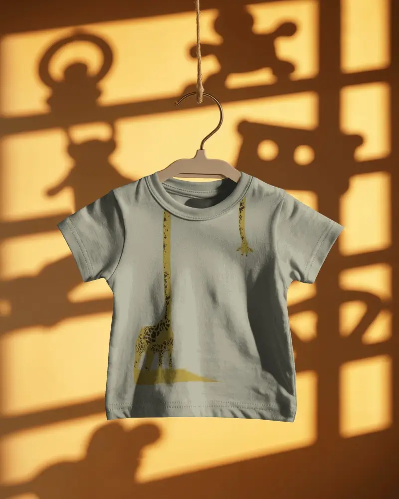 Baby Tee Mockup Hanging On Wooden Hanger With Warm Sunlit Shadows Minimal Studio Aesthetic