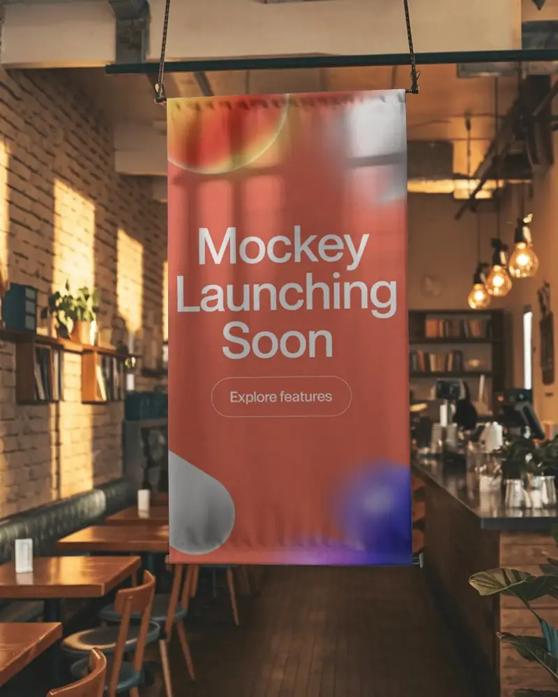 Cozy Cafe Banner Mockup Hanging From Ceiling With Soft Sunlight And Exposed Brick Wall Background