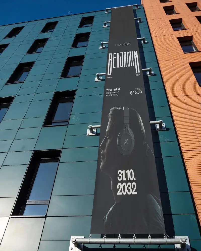 Vertical Banner Mockup On Modern Building Facade With Clear Sky Background Urban Setting