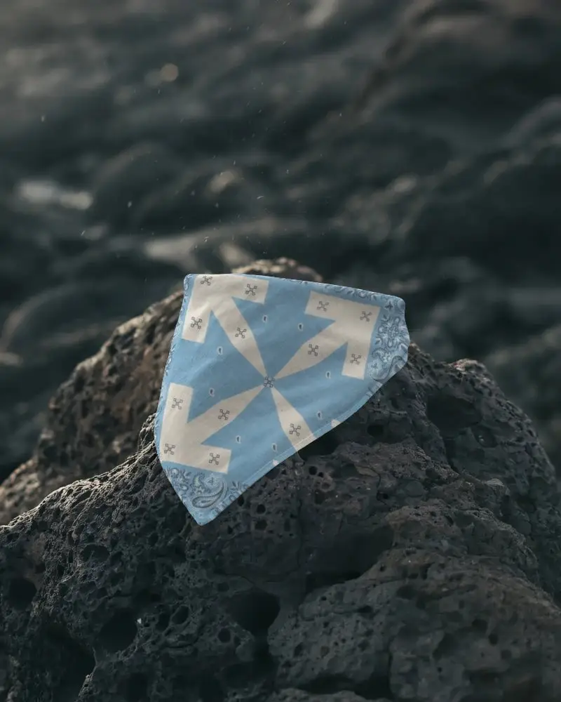 Versatile Triangle Bandana Mockup Showcasing Soft Fabric On Natural Rock Surface Background