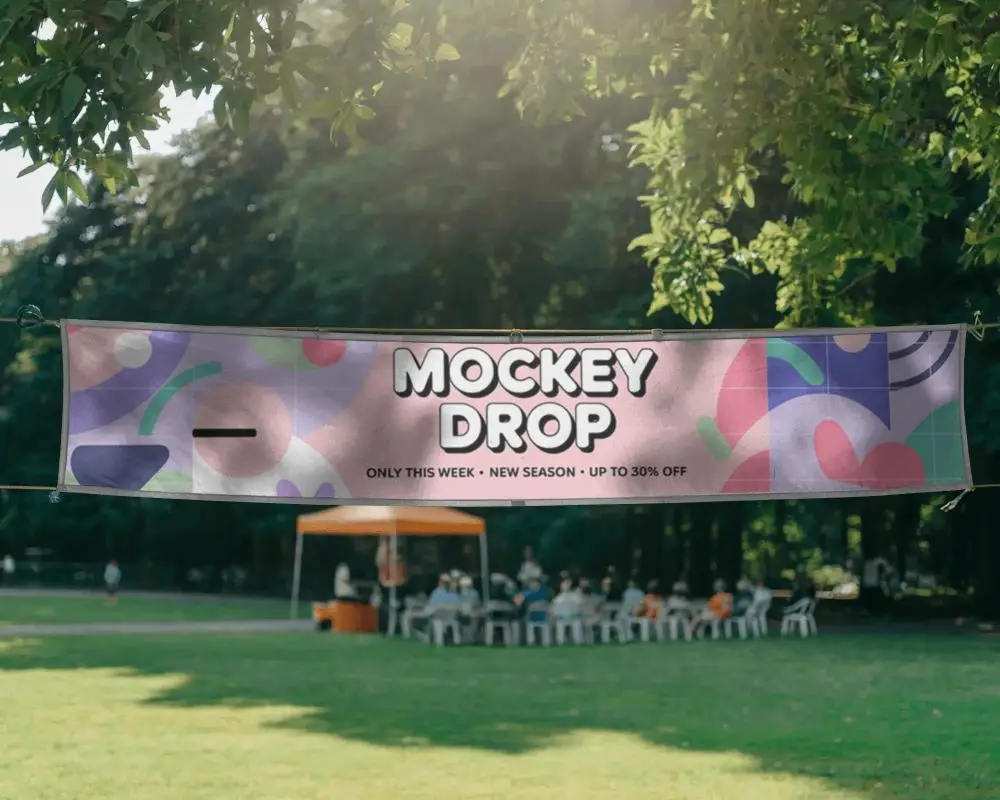 Outdoor Event Promo Banner Mockup On Hanging String In Park Field Landscape