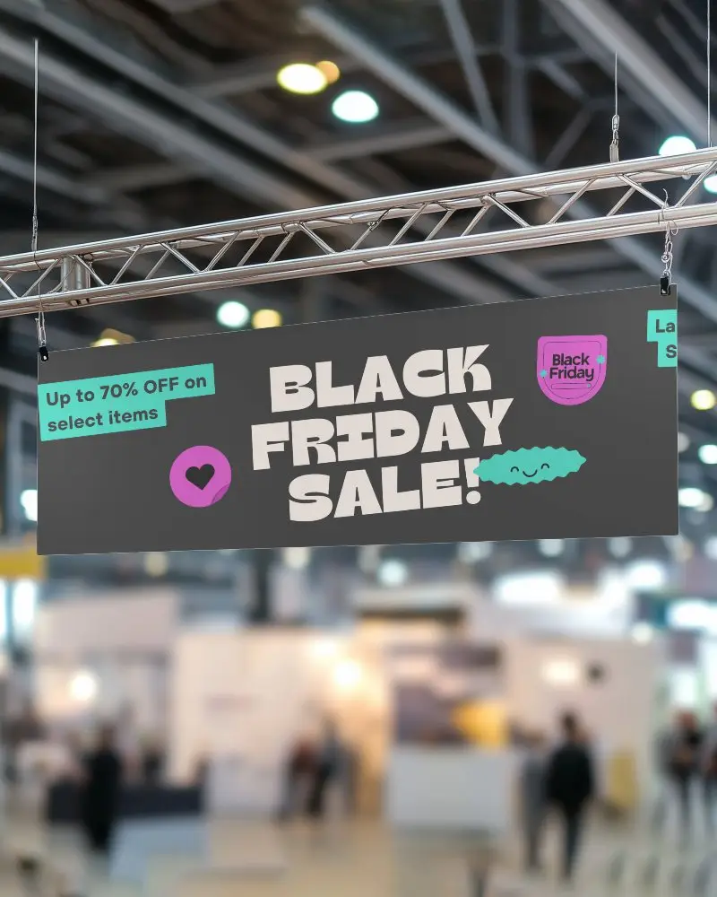 Trade Show Banner Display Mockup Suspended Above Booth With Blurred Event Background