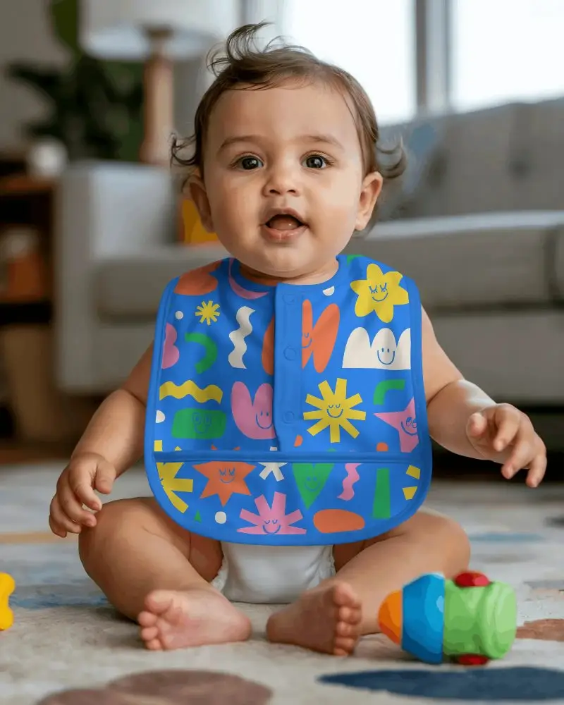 Baby Wearing Long Bib Mockup With Button Front Closure And Pocket For Easy Meal Time Cleanups