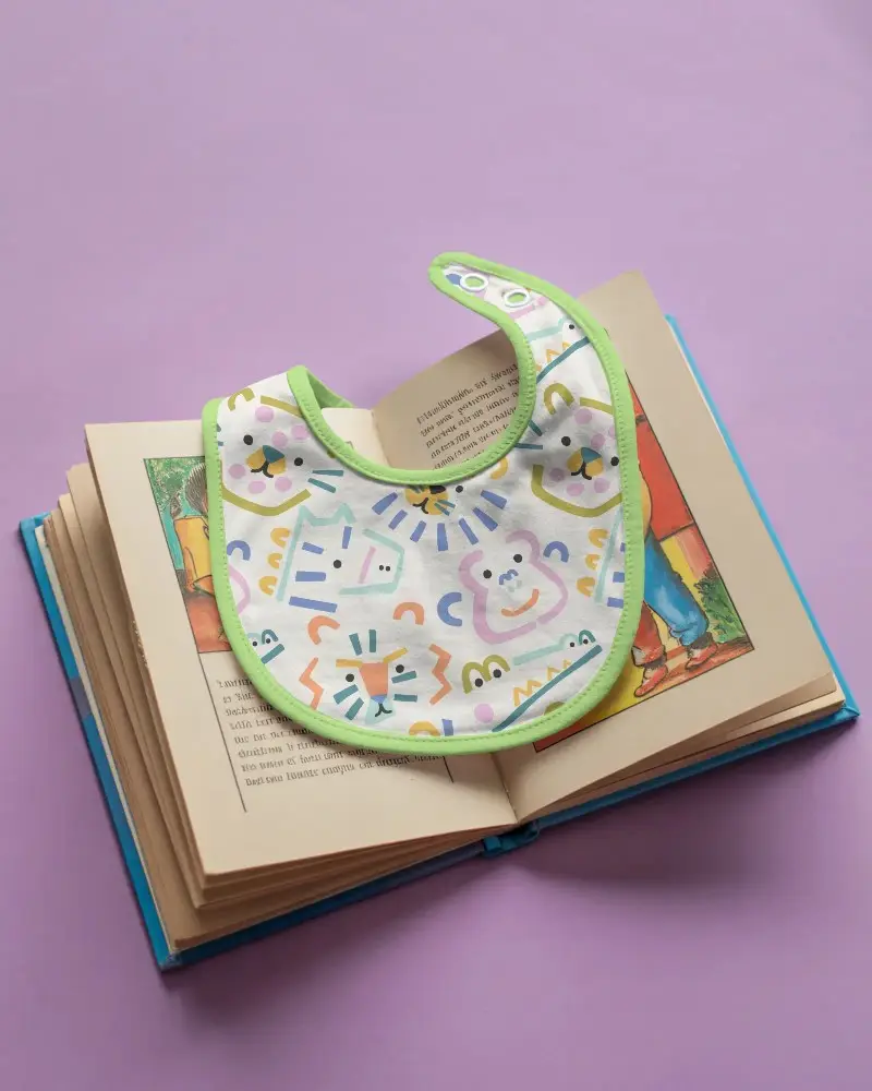Baby Bib Mockup Feature Soft Fabric And Easy To Clean Design Perfect For Infant Care Products