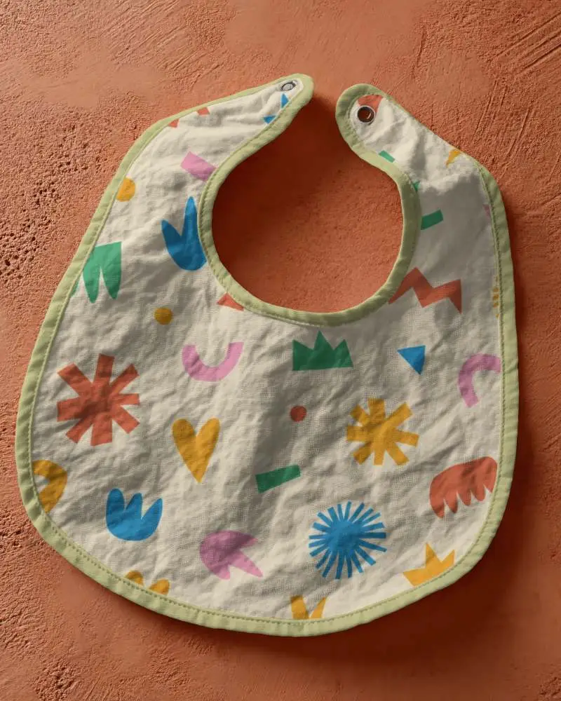 Baby Bib Mockup With Adjustable Snap Closure For Infant Feeding Session Presentation
