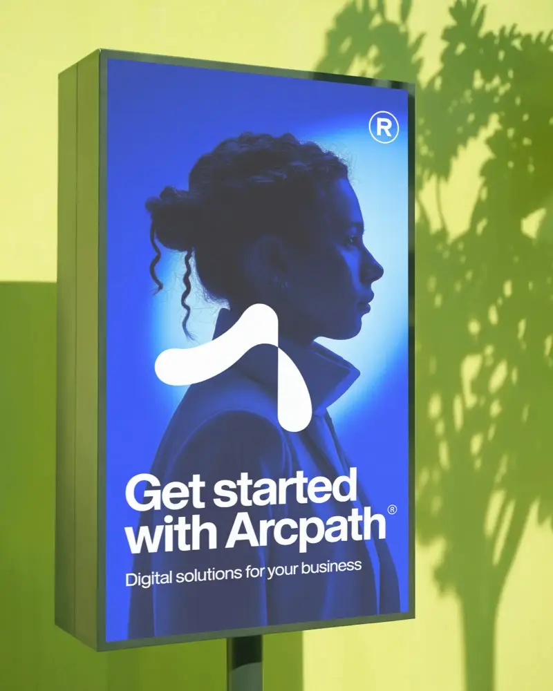 Vertical City Signboard Mockup On Green Surface With Sharp Natural Light And Soft Leaf Shadow