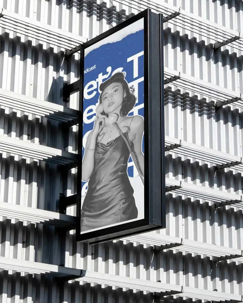 Vertical Urban Billboard Mockup On Modern Industrial Building Exterior For Advertising