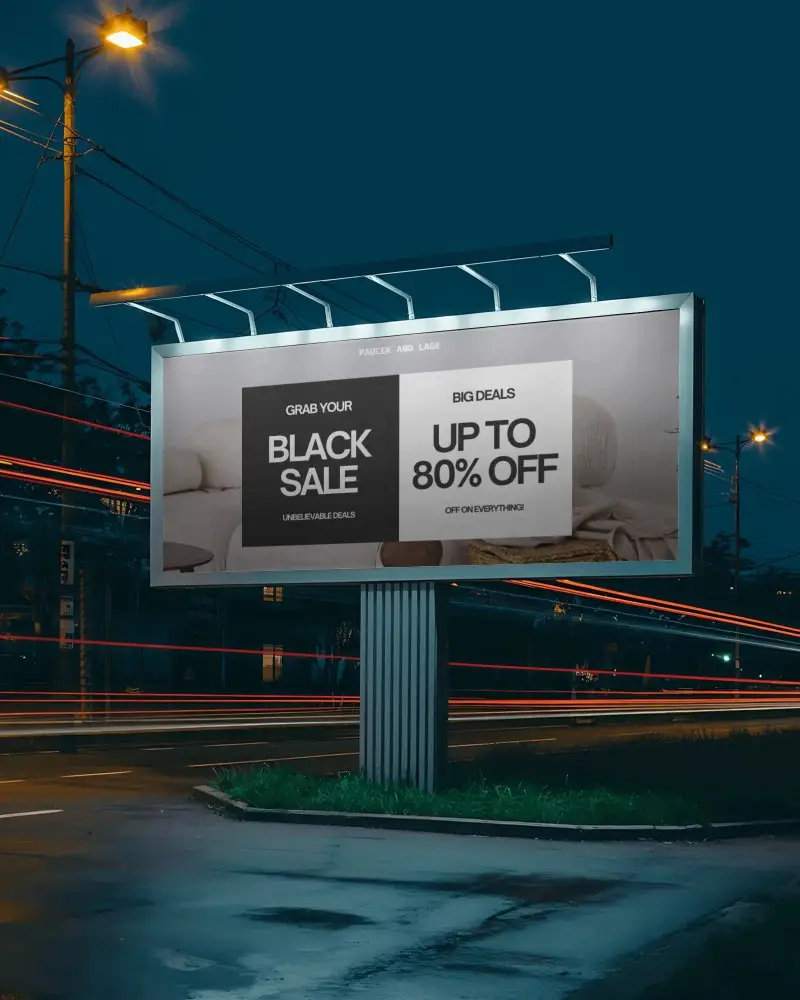 High Resolution Billboard Mockup Outdoor Advertisement Lit By Streetlight At Nighttime