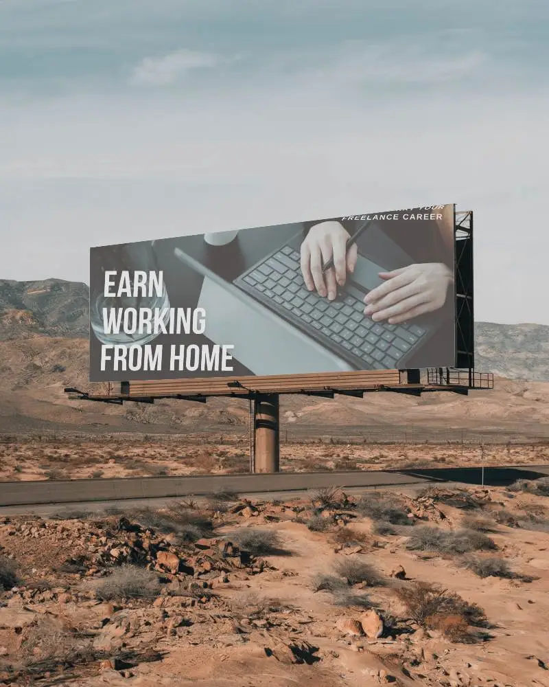 Desert Highway Billboard Mockup Remote Work Ad With Laptop And Hands Under Clear Sky Promoting Digital Nomad Lifestyle 0189