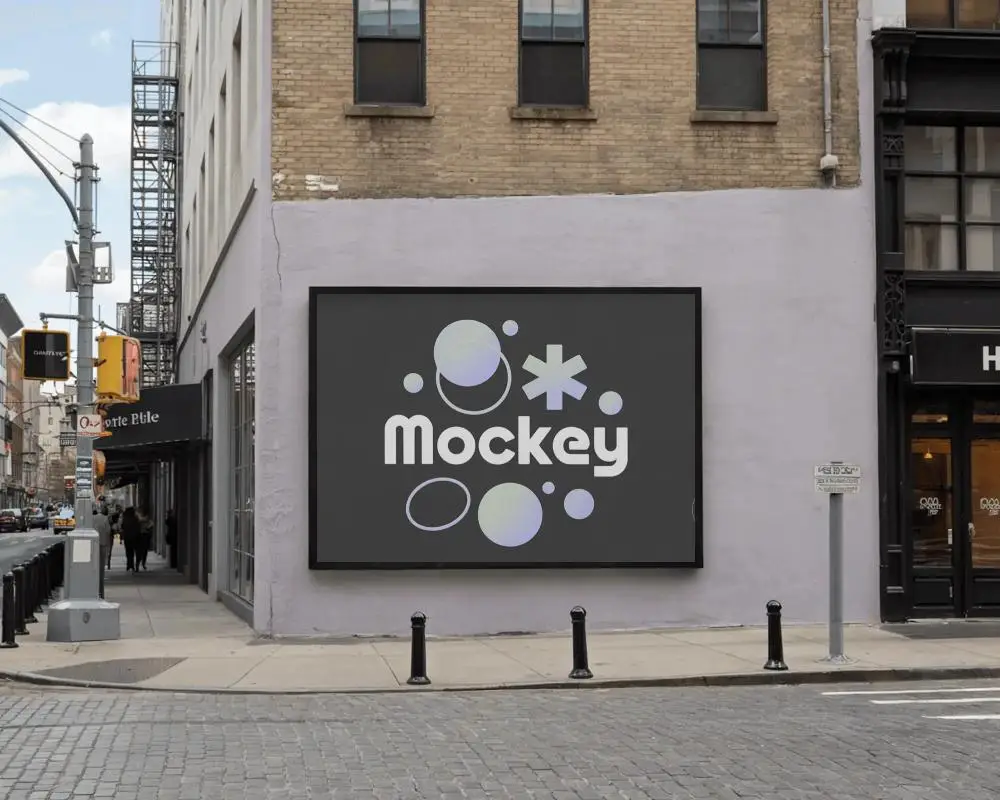 urban-street-corner-horizontal-billboard-mockup-old-brick-building-and-cobblestone-pavement